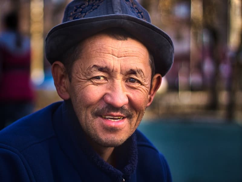 A patient smiling during a consultation